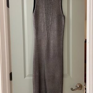 Gorgeous one of a kind metallic knit wow couture dress.   Size small.